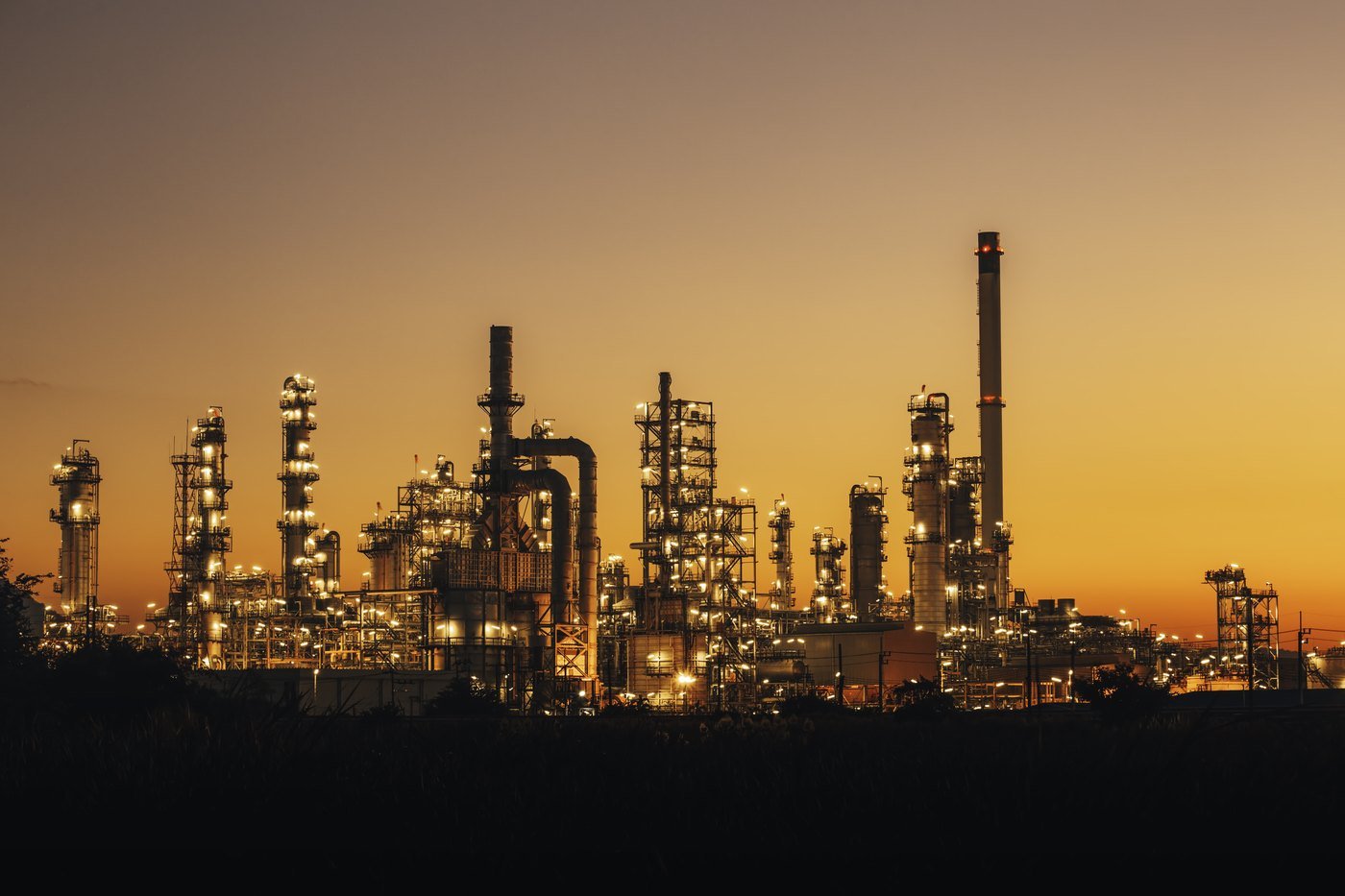 Refinery skyline at sunset — industry updates